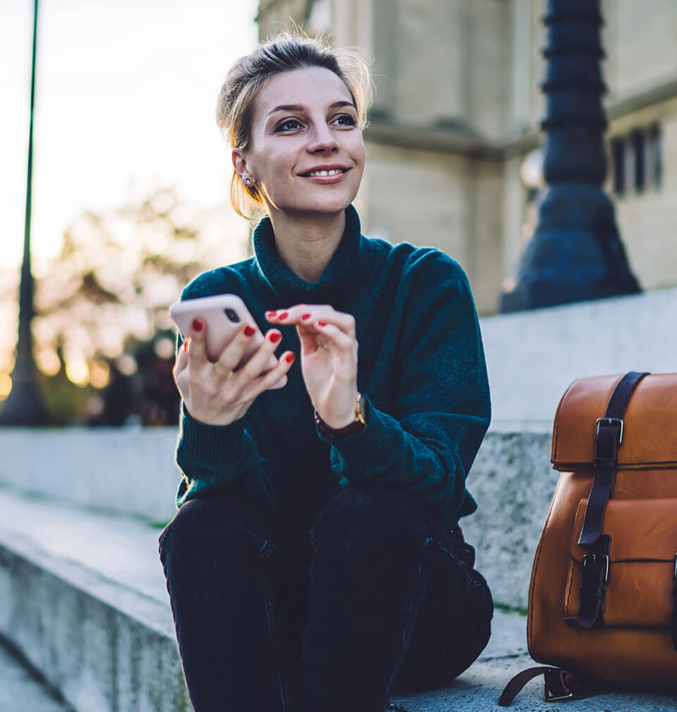 smiling woman with a mobile phone