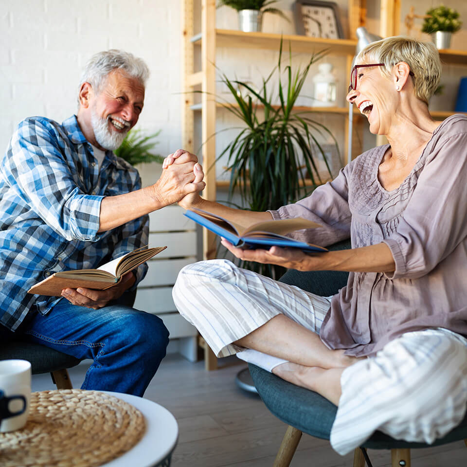 an older couple celebrate their retirement