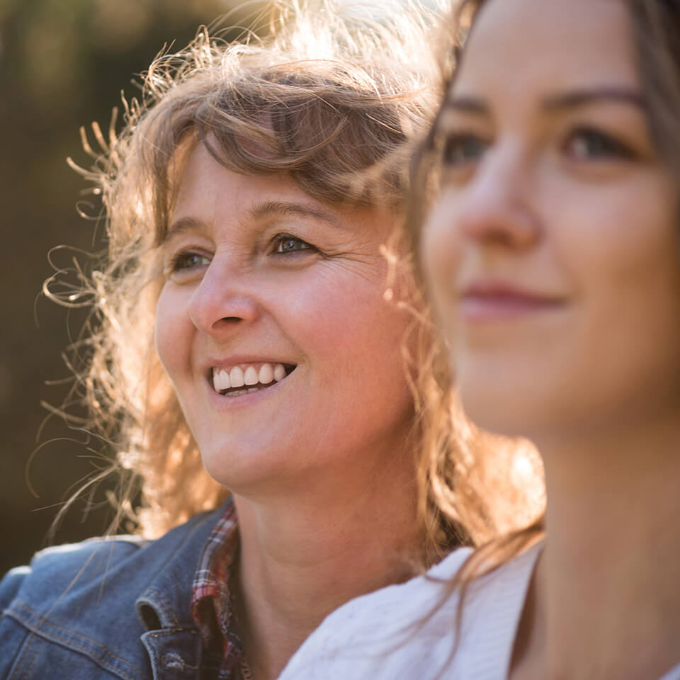 two women looking into the distance